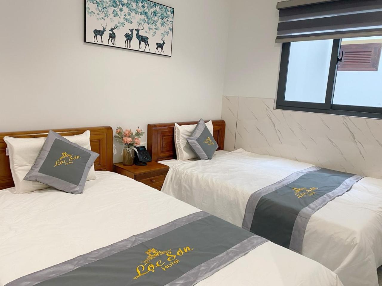 Loc Son Hotel Буонметхуот Экстерьер фото