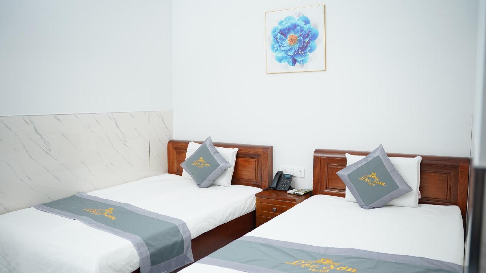 Loc Son Hotel Буонметхуот Экстерьер фото
